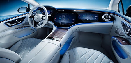  Image where we see the interior of an electric Mercedes. Benefits of electric intelligence. Electric Mercedes interior. Luxury vehicle interior. Merecdes. Mercedes Blainville.